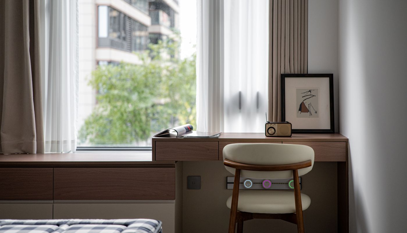 Calm modern home corner with warm wood storage and soft light