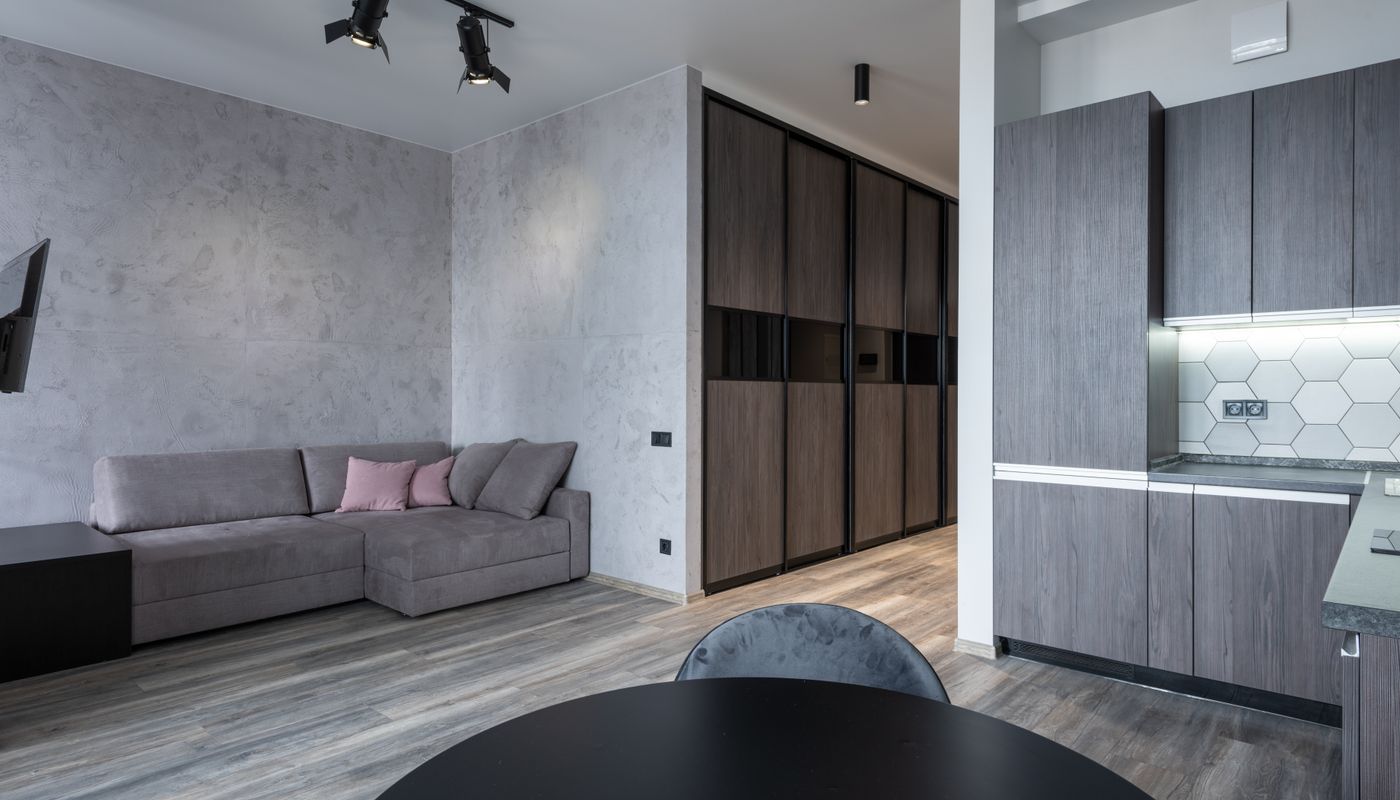 Modern bedroom interior with full-height wardrobe storage